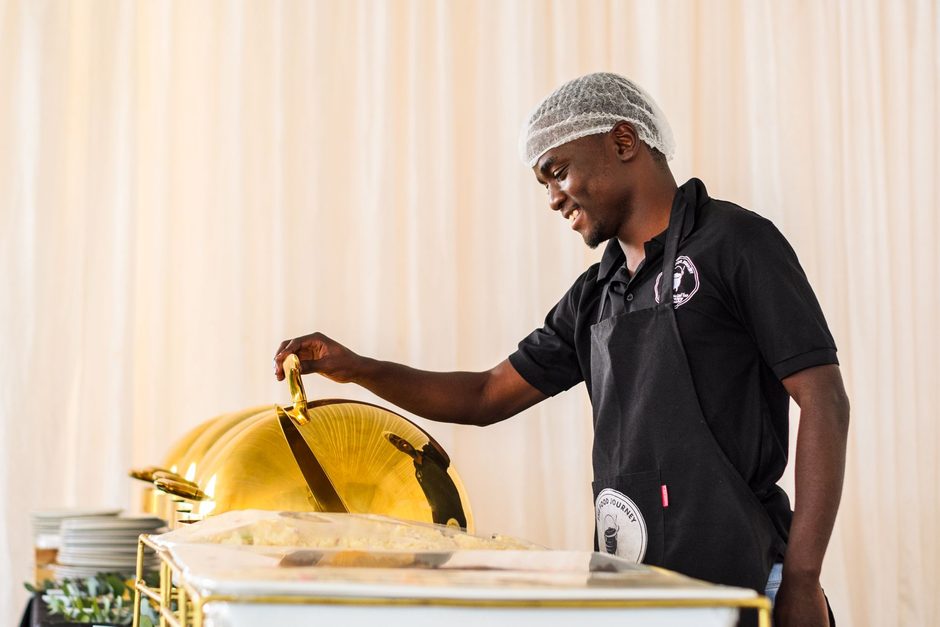 Caterer preparing food for an event