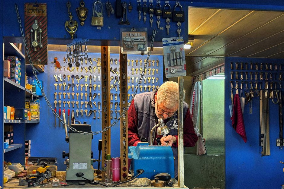 Locksmith at work in his shop